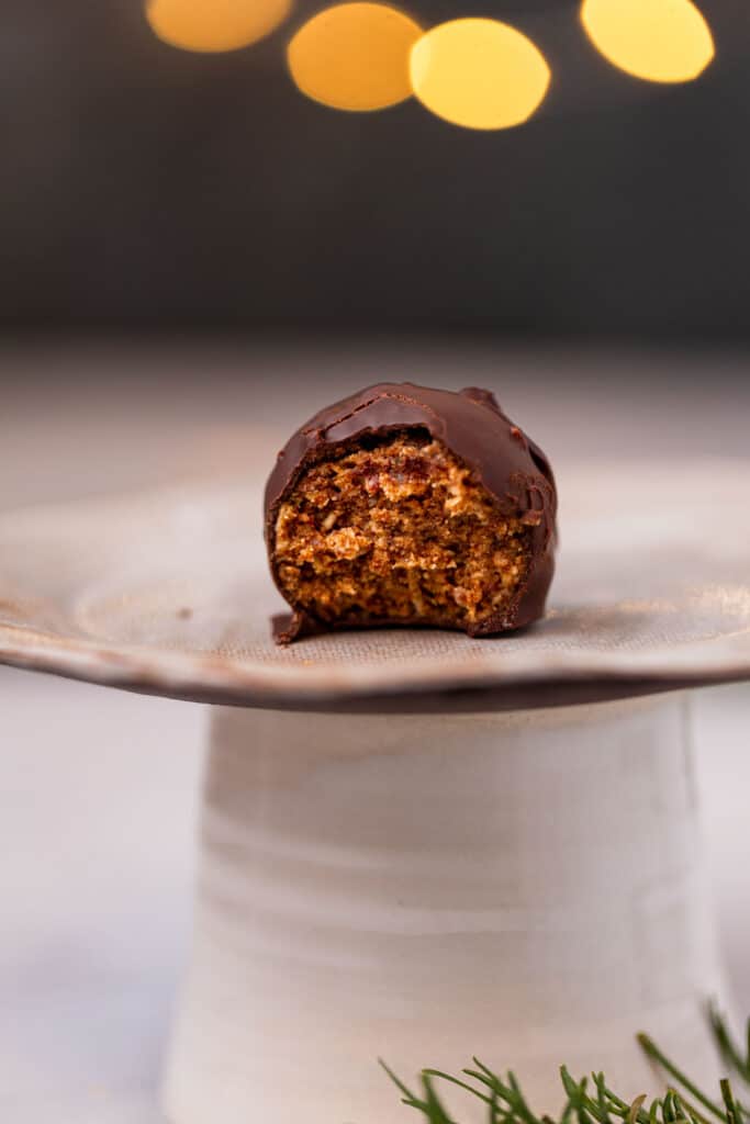 a chocolate peanut butter ball with a bite out of it