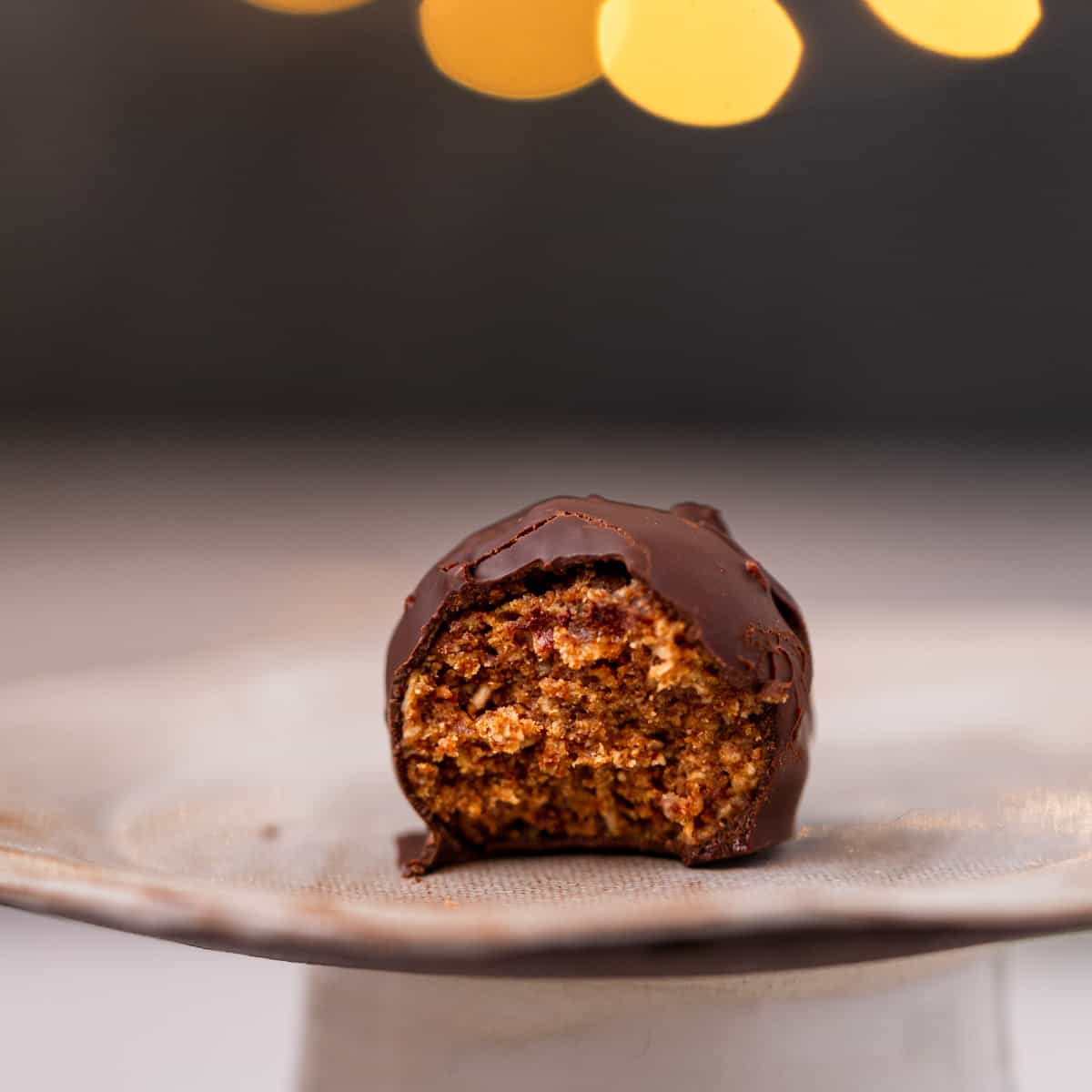 a chocolate peanut butter ball with a bite out of it