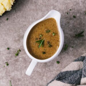 a gravy boat filled with mushroom gravy