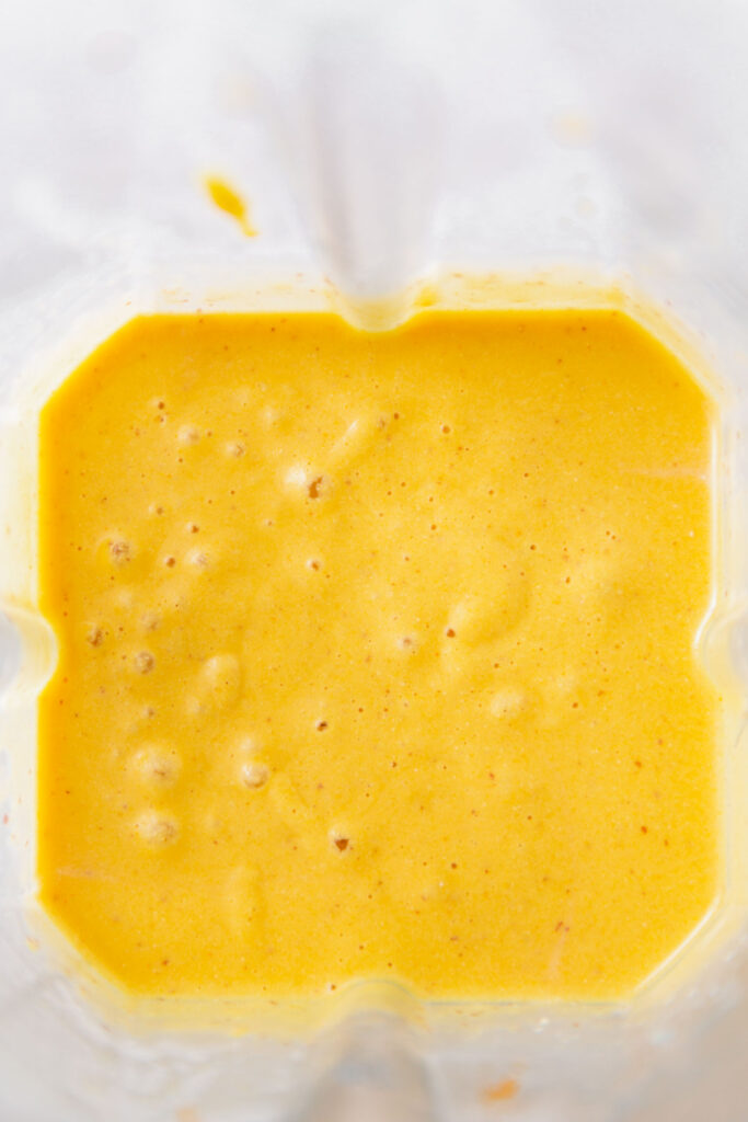 vegan cheesy sauce in a blender