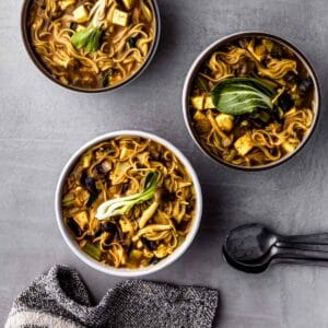 three bowls of curry ramen