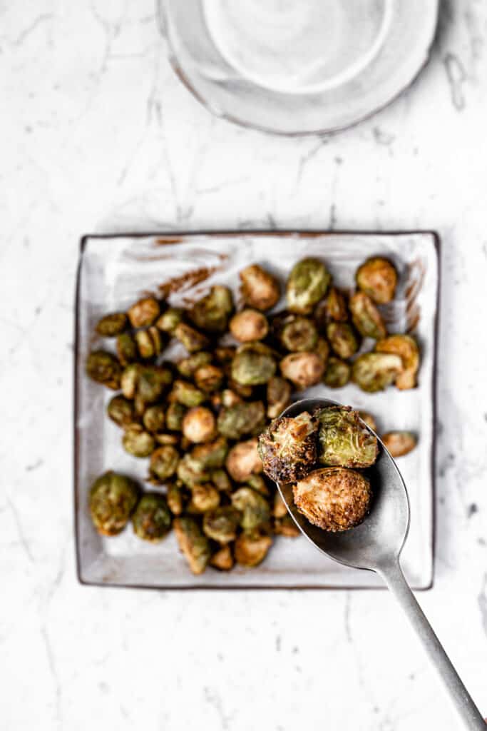 roasted brussel sprouts on a square plate