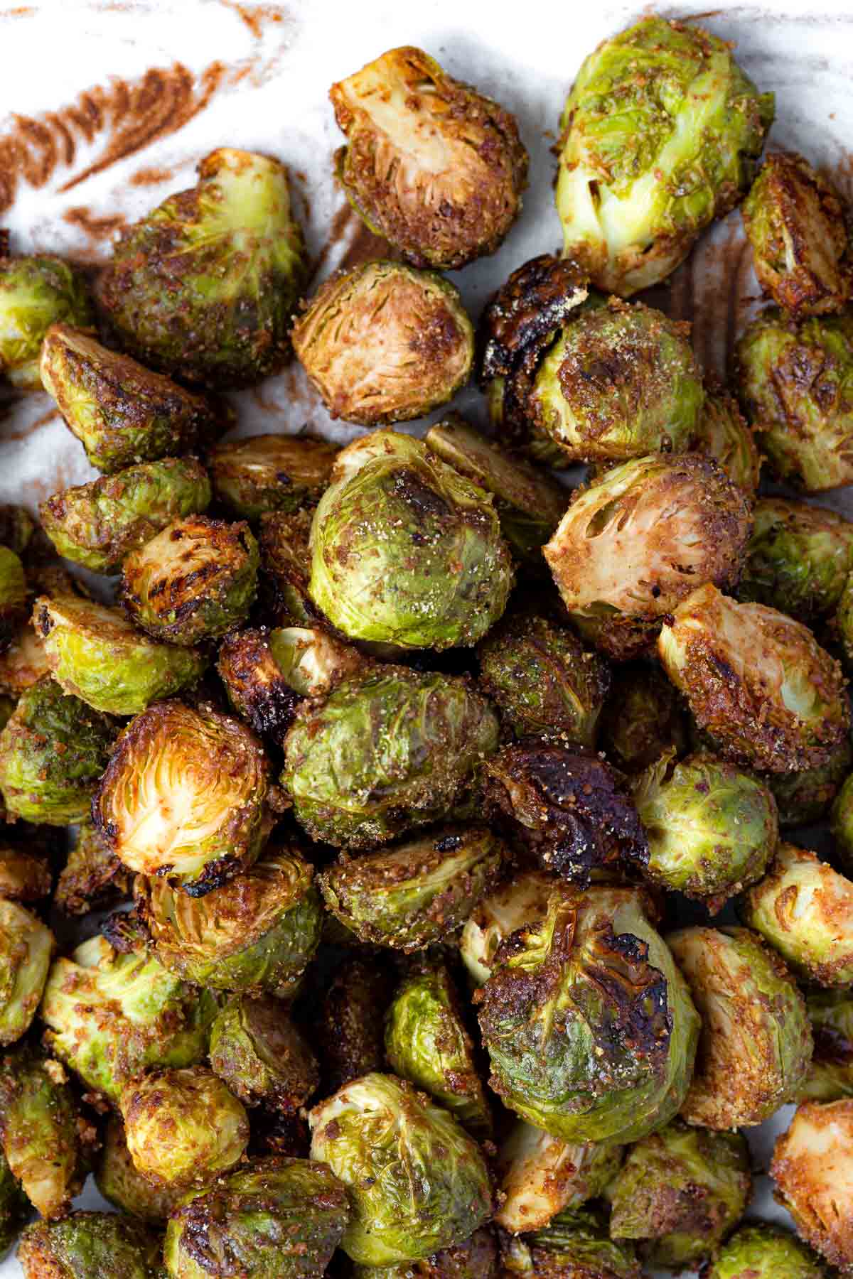 A closeup view of Maple Balsamic Roasted Brussels Sprouts on a plate.