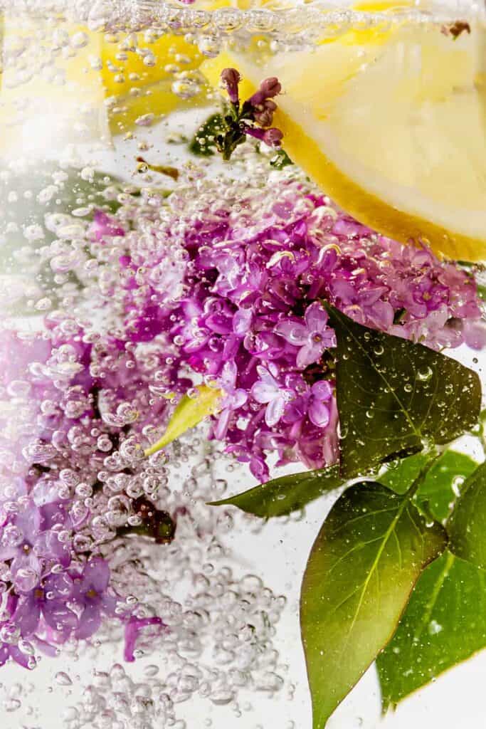 A close-up of lilac and lemon water