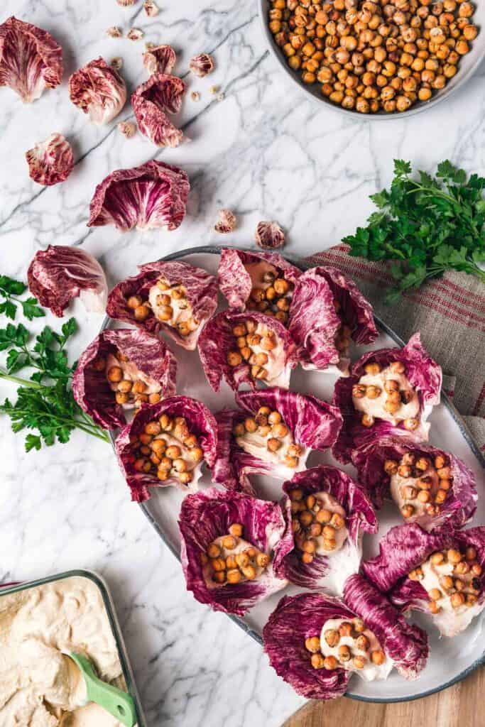 Crispy chickpeas and hummus in radicchio leaves