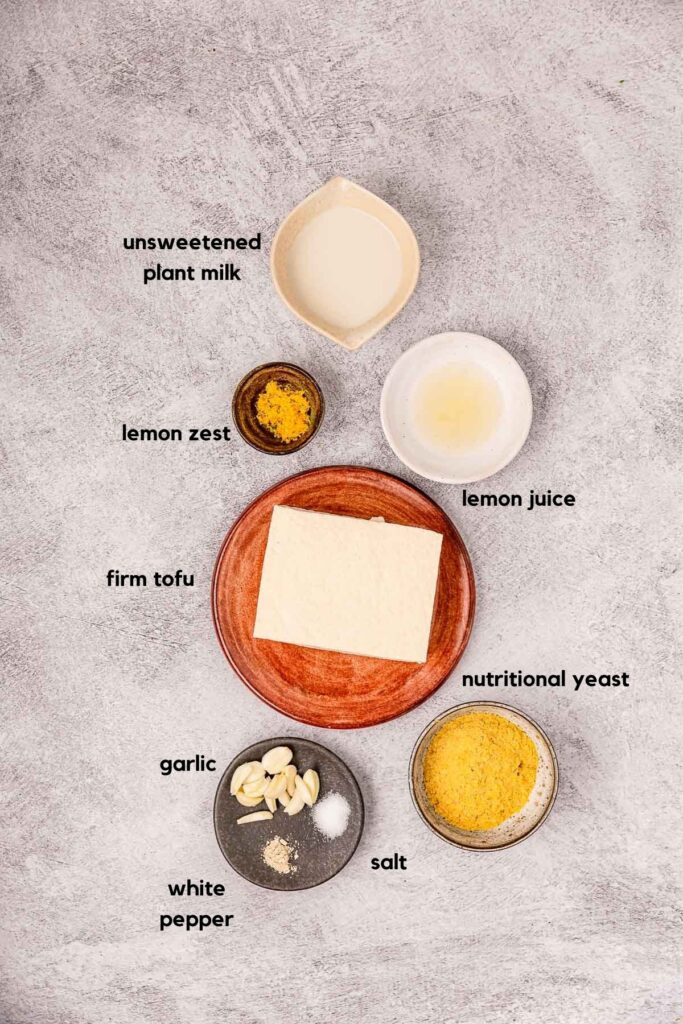 The ingredients for making vegan lemon garlic aioli.