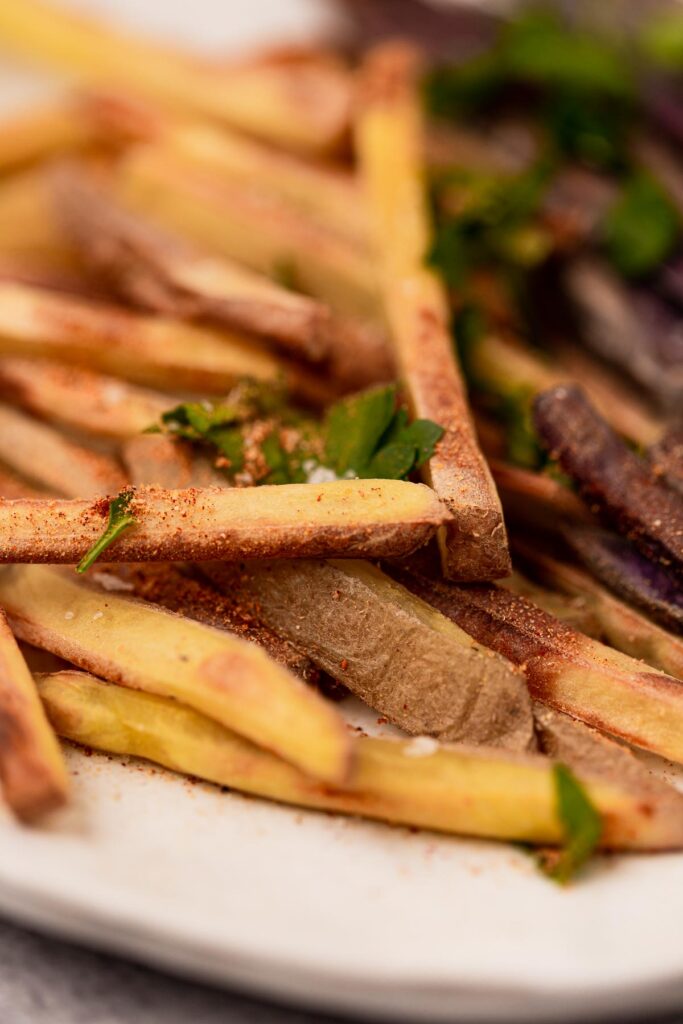 A closeup view of homemade french fries.