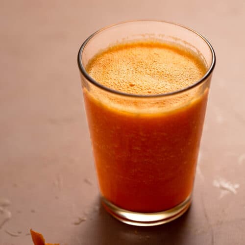 Fresh-made orange-carrot juice in a glass.