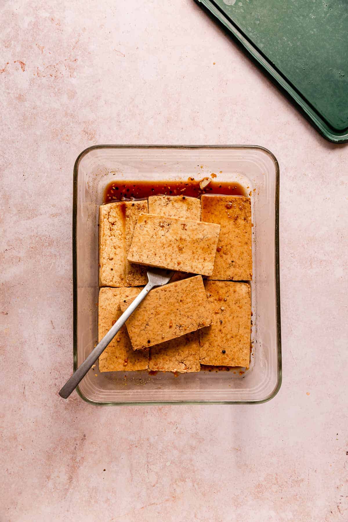 Tofu steaks covered in marinade.